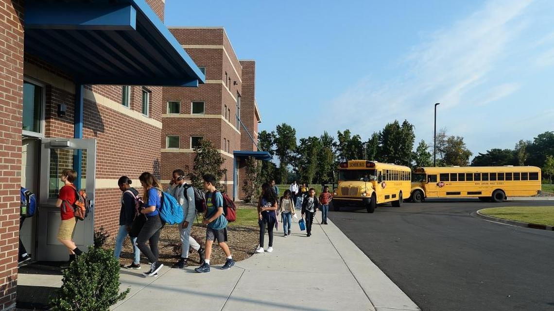 J.M. Alexander Middle School, recently rebuilt with bond money, could become one of two middle schools used for all Huntersville residents under a CMS plan approved Tuesday.