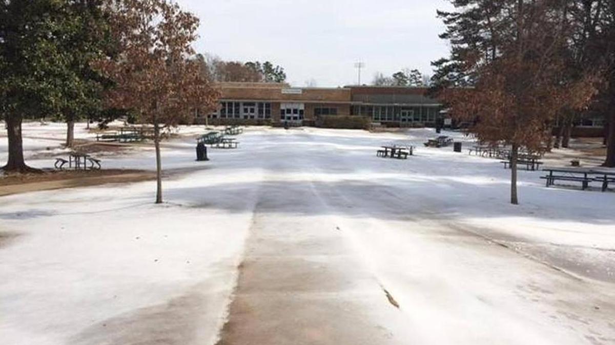 This photo, taken Monday at Myers Park High, shows the kind of icy spots that kept CMS closed Tuesday.