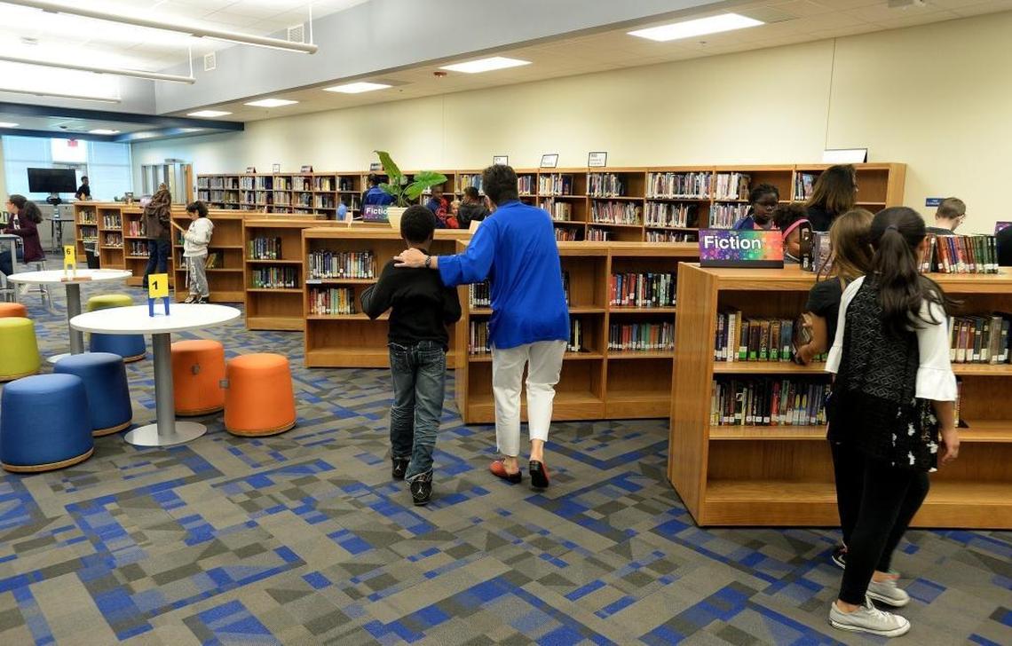 Students use the media center at the new J.M. Alexander Middle School building in Huntersville.