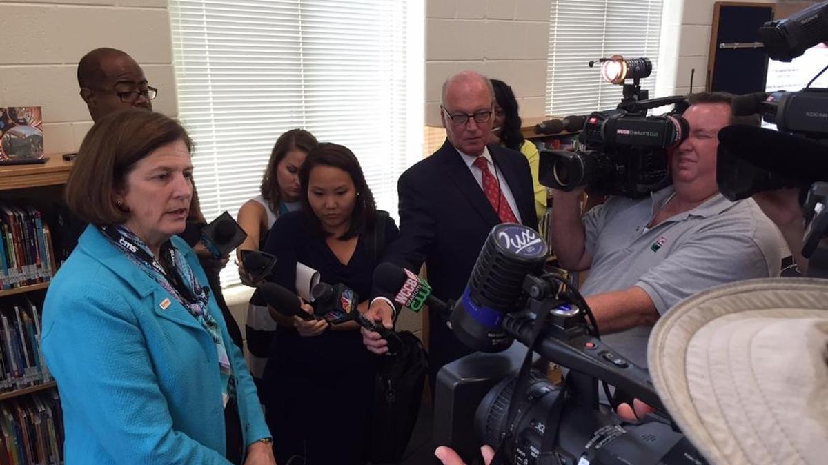 
CMS Superintendent Ann Clark fields media questions about the budget and test results at Bain Elementary on Wednesday.
