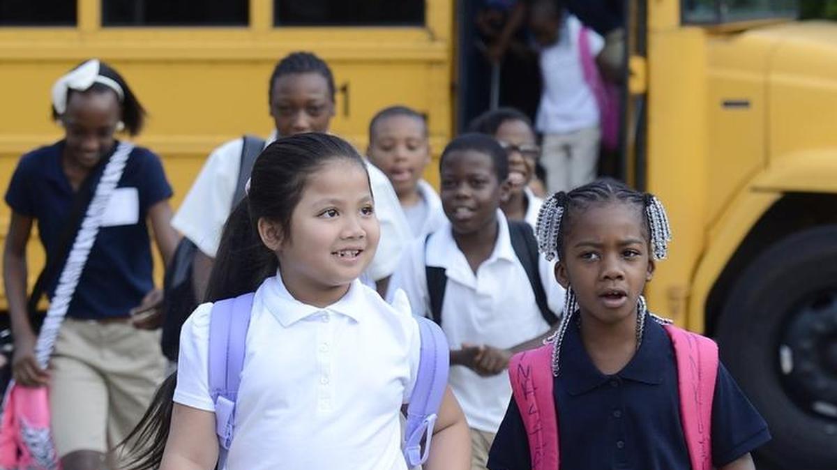 Students arrive at Druid Hills Academy, one of the combined elementary/middle schools CMS is reviewing for change as part of its assignment review.