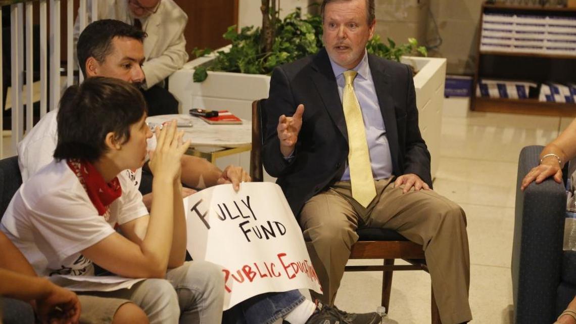 Speaker Phil Berger holds an unscheduled meeting with educators during a 2014 “Moral Monday” demonstration.