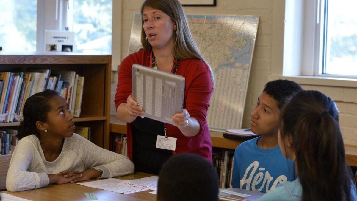 Jackie Barone, principal of CMS’ Piedmont Middle School, says she could see a pay cut under the new system, even though her school was graded A+ and she just won a national award.