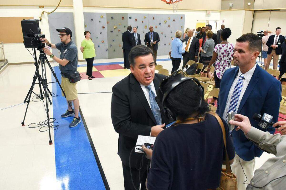 Superintendent Clayton Wilcox (left) and Chief Communications Officer Tracy Russ (right) fielded media questions after Wednesday’s back-to-school news conference.