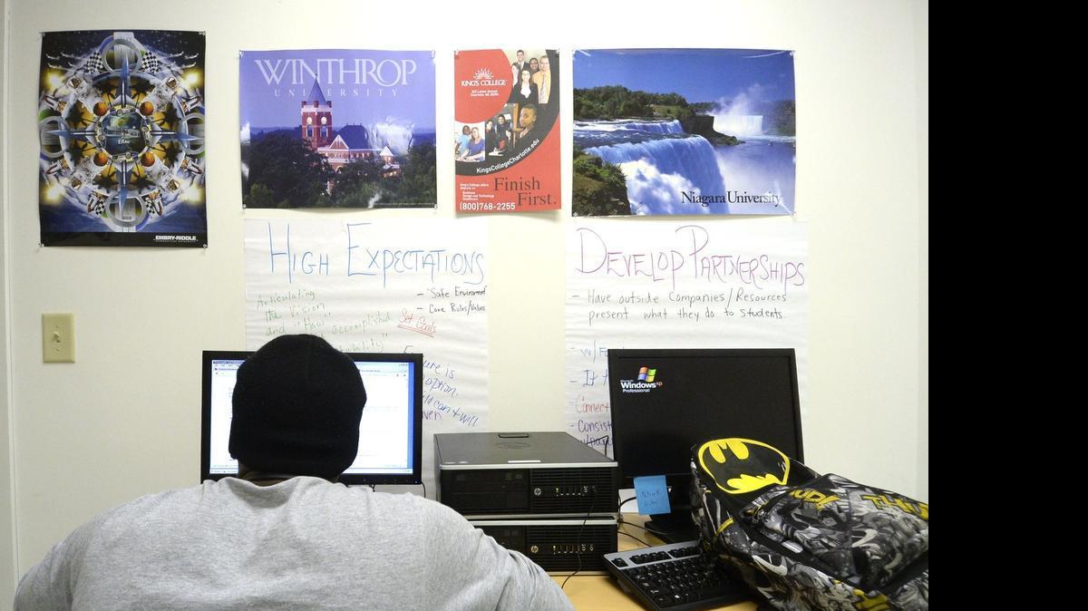 
Students at the LIFT Academy go through their coursework using computer programs. 
