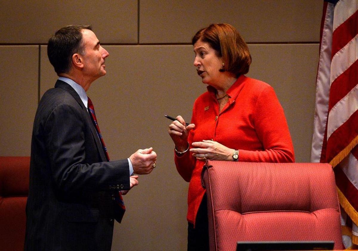 Eric Davis, District 5, left and CMS Superintendent Ann Clark speak prior to the CMS boundary hearing on Tuesday, May 9, 2017 at the Charlotte-Mecklenburg County Government Center in Charlotte, NC.