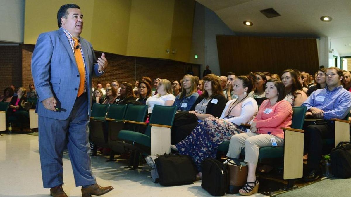 Washington County Superintendent Clayton Wilcox addresses new teachers at South Hagerstown High School.
