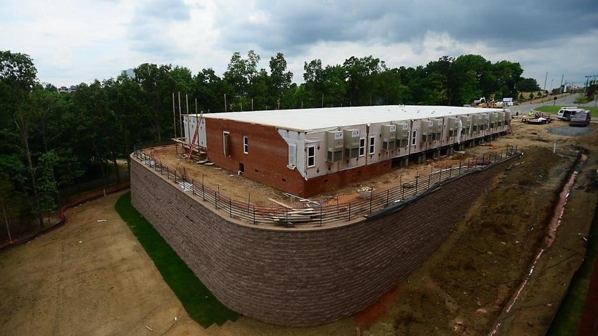 In 2014, Charlotte-Mecklenburg school board members said the superintendent had failed to inform them about cost overruns at the UNC Charlotte early college high school.