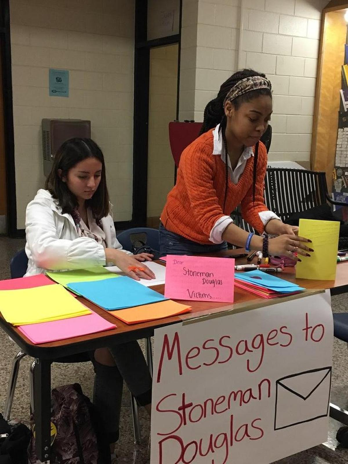 South Mecklenburg High School students Marian Baez Hernandez (left) and Jaelyn Lockhart collected letters of support and encouragement for survivors of the Stoneman Douglas shooting.