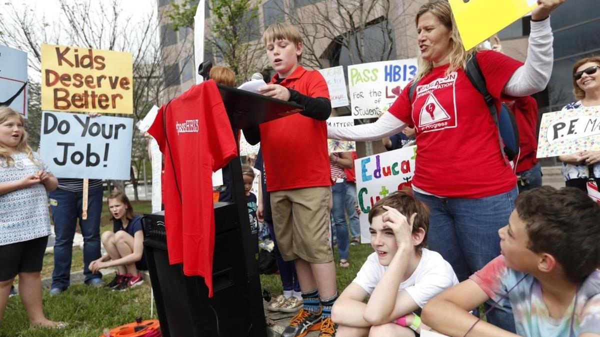 Students and parents participate in an April rally, held at the Halifax Mall in Raleigh, for a compromise on the class-size bill.