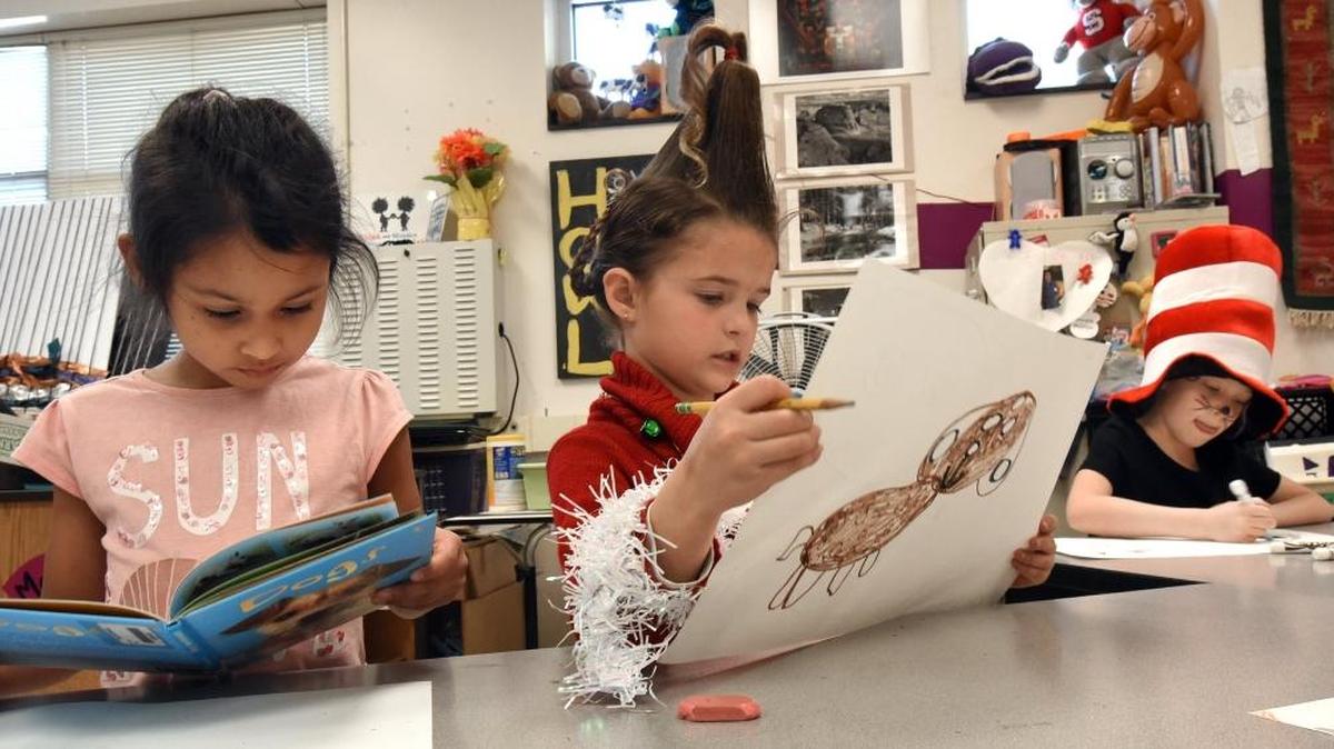 First-graders (from left) Vanessa Mendez-Moreno, Lilah Morgan and Blake Ward work on art projects in Jennifer McIntyre’s art class at Timber Drive Elementary School in Garner on March 2, 2017.