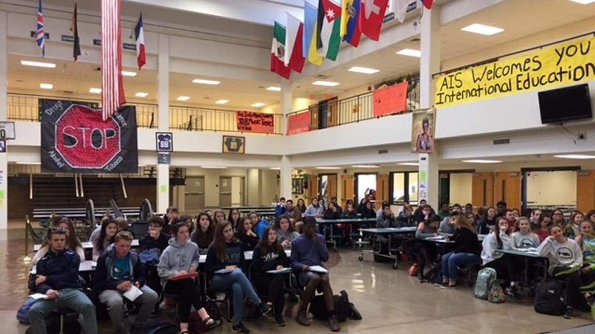 Flags of many nations fly at Independence High, which includes an Academy of International Studies.