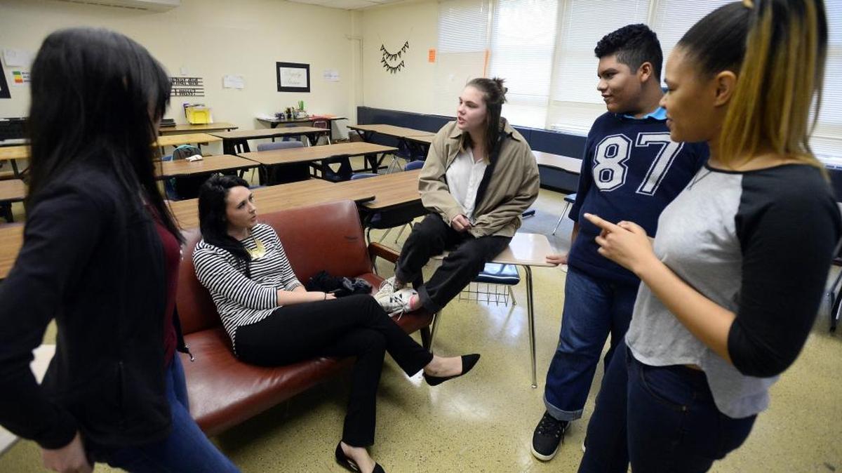 Students at Garinger High, where two consecutive years of strong growth on state exams cost the principal a shot at a new $10,000 state bonus.