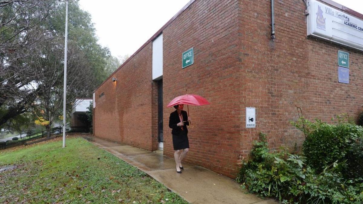 Veritas charter school founder Katy Ridnouer outside the old Villa Heights school, which is at the heart of a dispute between Veritas and Charlotte-Mecklenburg Schools.