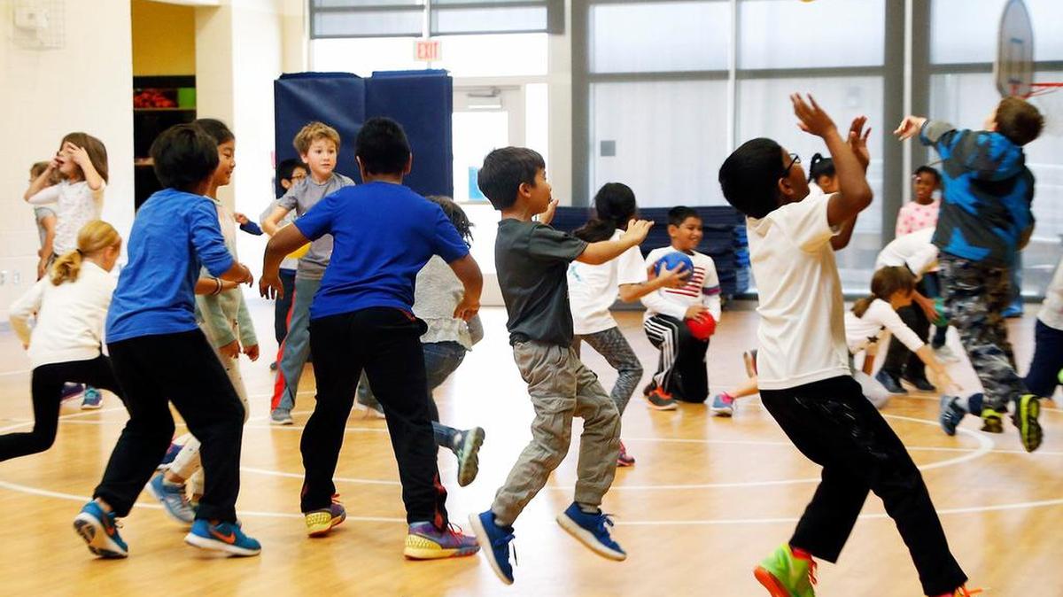 Third graders play during gym class at Mills Park Elementary in Cary on Nov. 22, 2016. School leaders say reducing class sizes to meet new state limits will force them to consider options such as cutting physical education and arts classes, raising class sizes in upper grades and asking counties to pick up the tab.