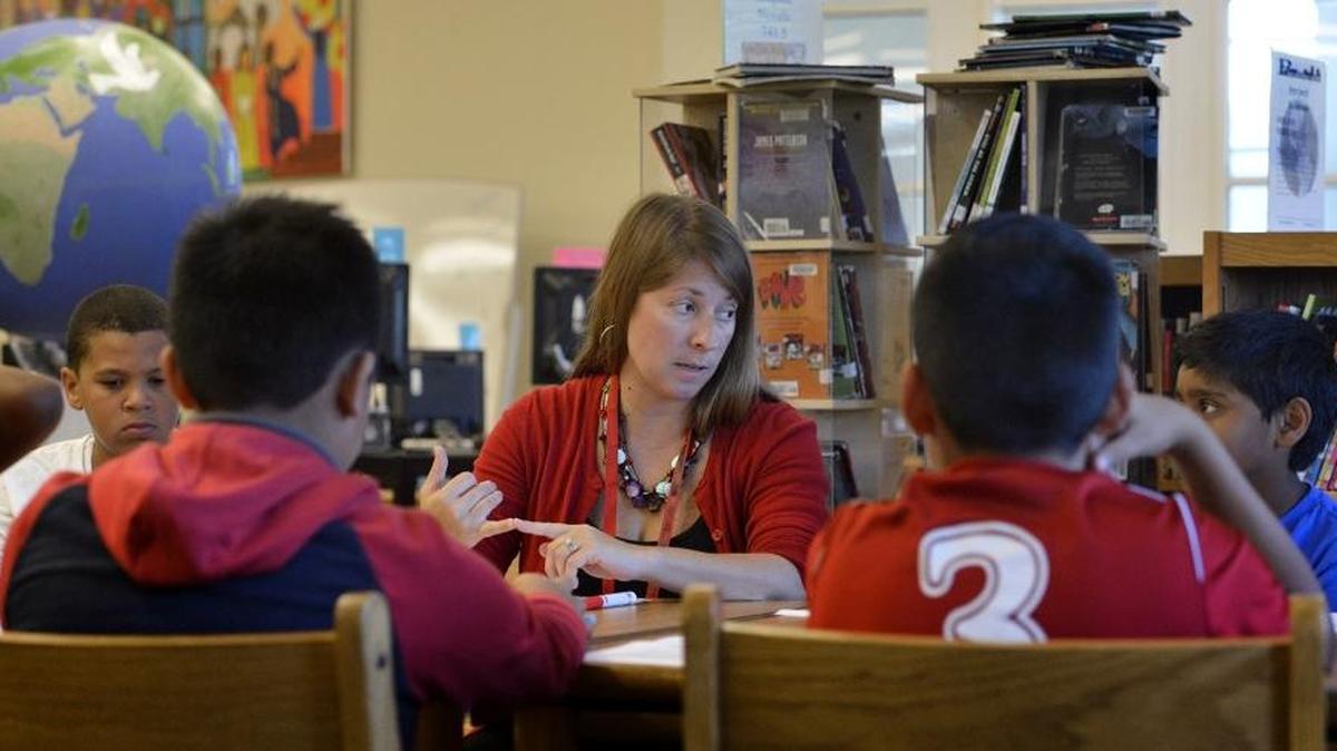 Principal Jackie Barone talks to Piedmont Middle students in 2015.