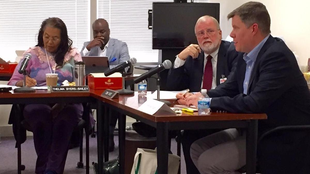 Former CMS board member Trent Merchant (right) offers advice on choosing a search firm, as board member Thelma Byers-Bailey (l-r), General Counsel George Battle III and board member Tom Tate listen.