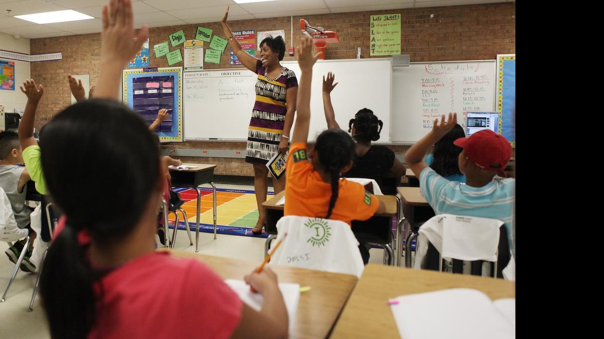 
Tonya Allison, a teacher at Hidden Valley Elementary School, engages her students at summer reading school last year. 
