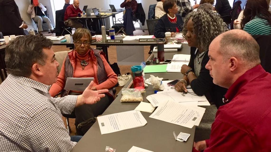 CMS Superintendent Clayton Wilcox talks about equity with board members Ruby Jones, Ericka Ellis-Stewart and Sean Strain (left-right) at the school board retreat Saturday.