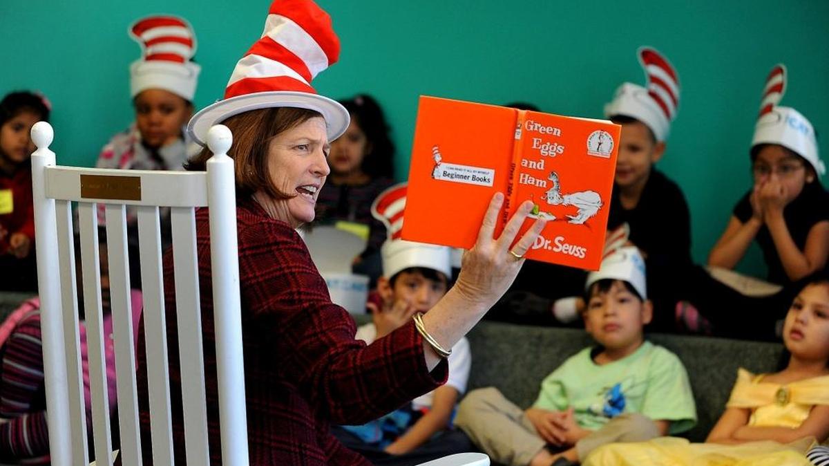 Charlotte-Mecklenburg Superintendent Ann Clark, shown reading to Montclaire Elementary first-graders on Dr. Seuss’ birthday, will meet the public while a search firm takes comments on her successor.