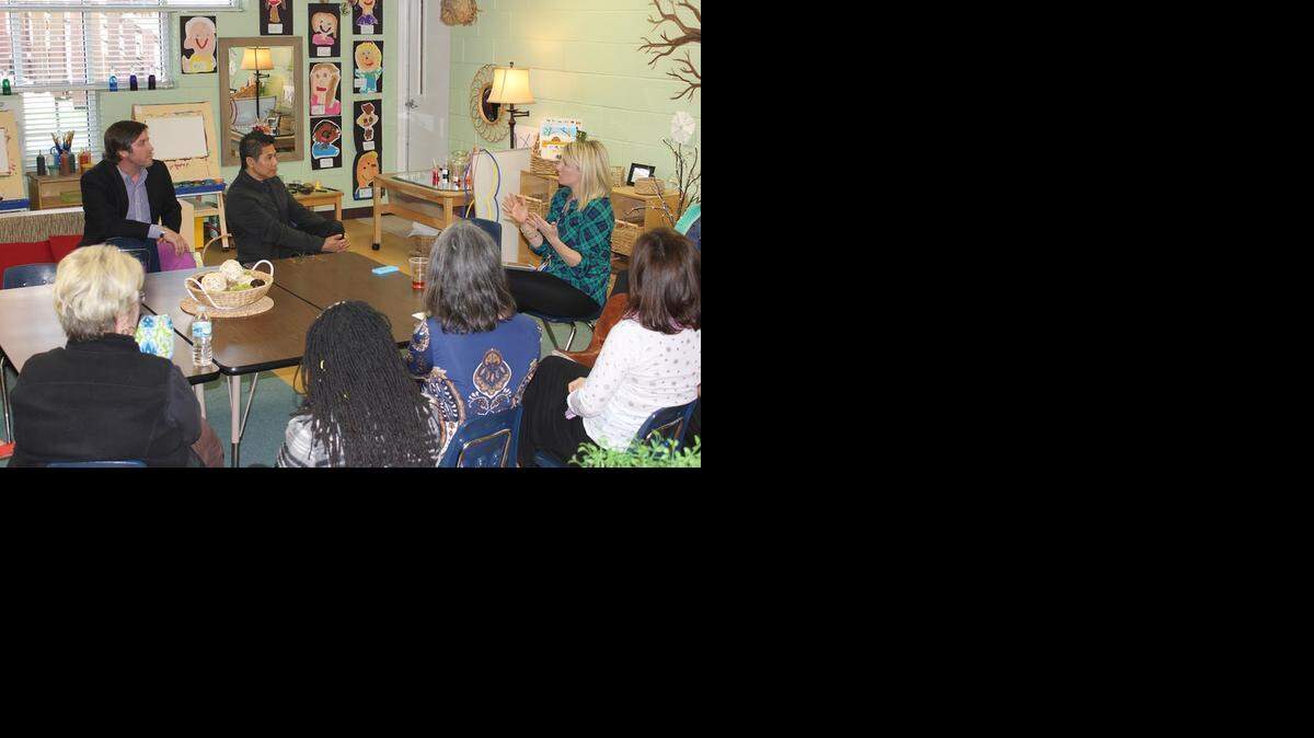 
Design experts Christian Long, left, and Trung Le of the firm Wonder, by Design speak with prekindergarten and kindergarten teachers and teacher assistants during a multiday workshop for Providence Day School.
