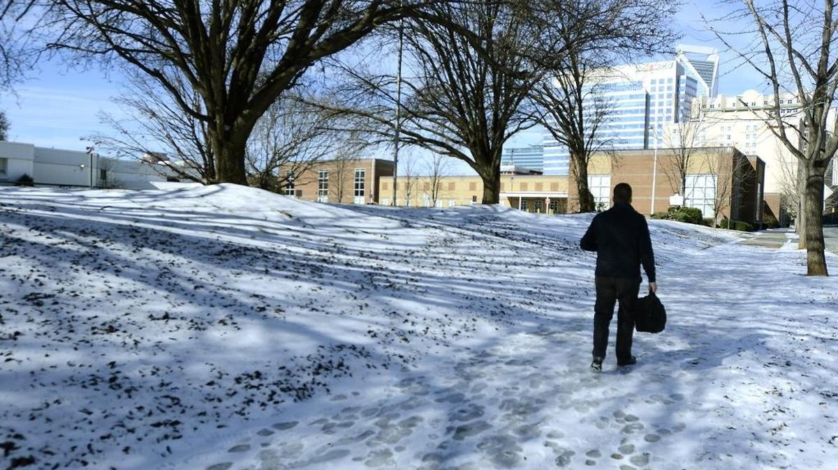 A winter storm earlier this month left roads and sidewalks icy, including this one near Metro School in uptown Charlotte.