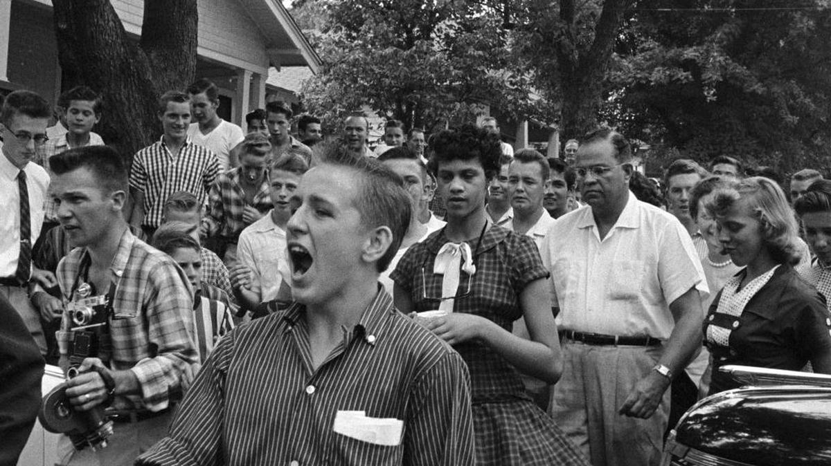 Dorothy Counts, center, tried to desegregate Harding High School on Sept. 4, 1957, but met hostility from white classmates and parents.