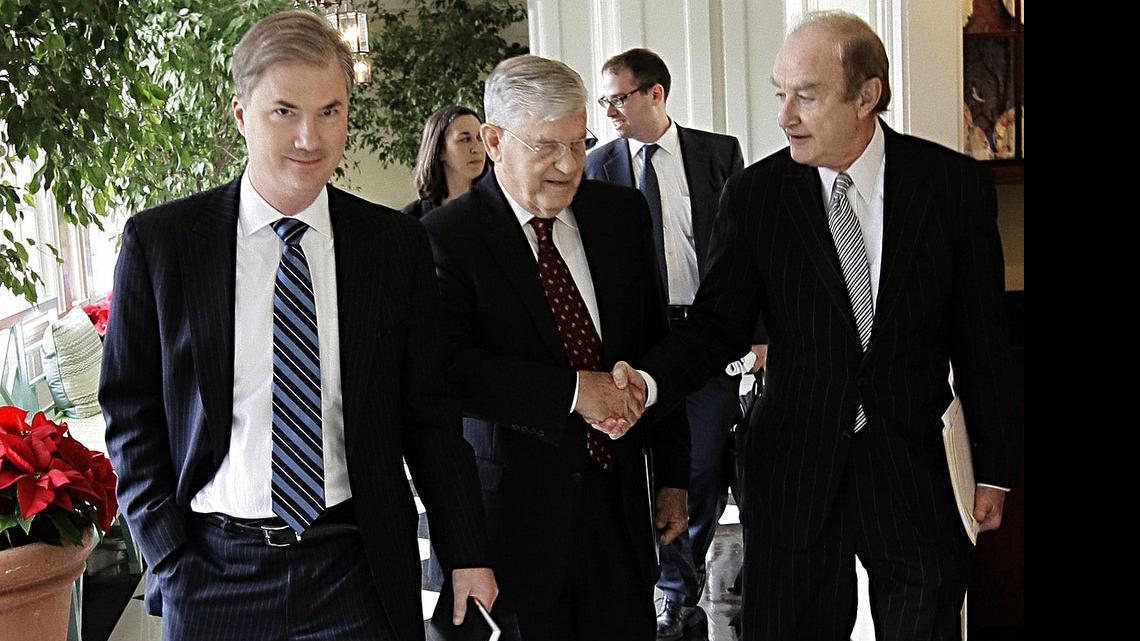 
Former Gov. Jim Martin, center, with then-UNC-CH Chancellor Holden Thorp, and Wade Hargrove, who was then chair of UNC’s board of trustees, after Martin delivered his report on UNC athletics in December 2012.
