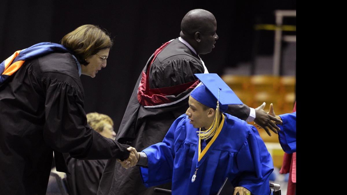 
Superintendent Ann Clark (left) at East Mecklenburg High’s graduation in June.
