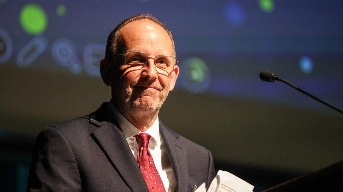 Gregory Gabriel smiles after being named Teacher of the Year by Charlotte-Mecklenburg Schools during the third annual Gem Awards ceremony at Dale F. Halton Theater at Central Piedmont Community College in Charlotte, NC on Tuesday, May 6, 2025. Gabriel, who is a teacher at Winterfield Elementary School, was honored along with the school district’s 2024-25 Teacher Assistant and Beginning Teacher of the Year.
