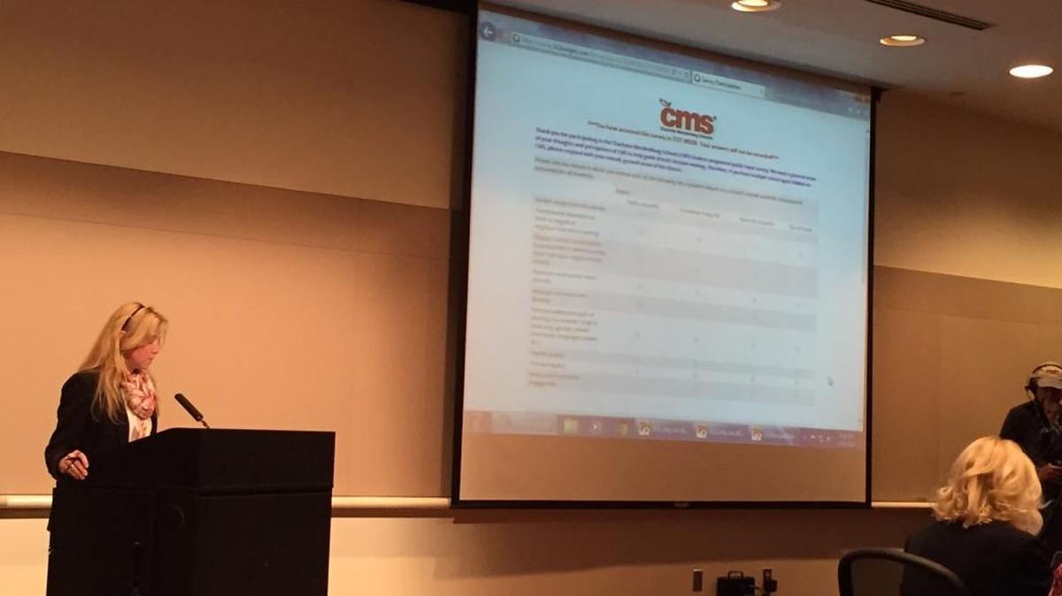 CMS staffer Lynne LaCaria gives the Charlotte-Mecklenburg school board a preview of the online student assignment poll.