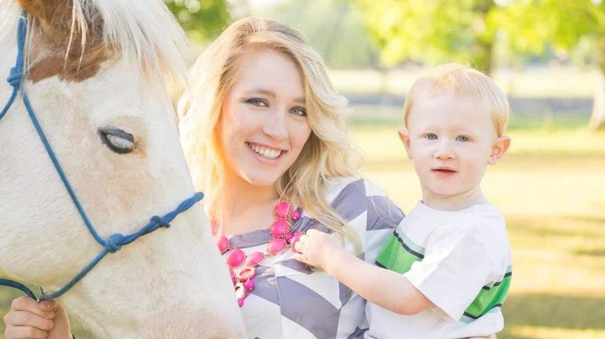 Chester High School valedictorian Cassie Herr with her son, 2-year-old Chance, and her horse, Bonnie.