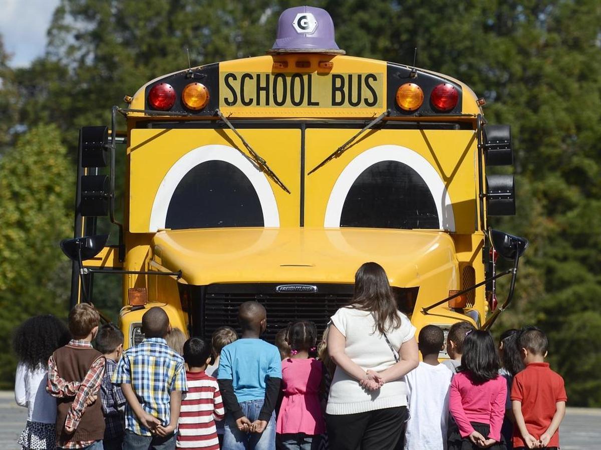 Kindergarteners at Clear Creek Elementary lined up in front of Gus during this 2013 visit, when CMS was celebrating Laura Ladd Jones’ 30th year on the job.