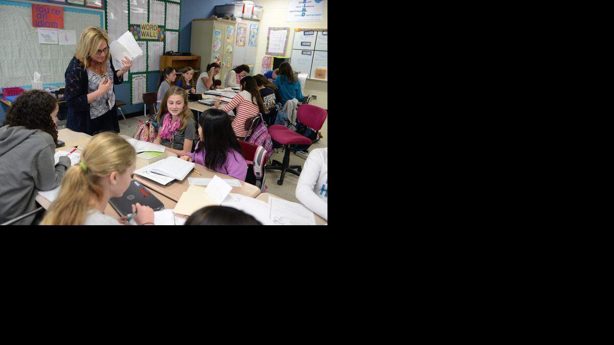 
In an all-girls class, sixth grade language arts teacher Leighanne Palinkas answers questions from students about the class assignment. CMS is looking into creating a single gender magnet school. South Charlotte middle school is the only middle school in Charlotte that has single-gender classes. Parents who want to have their child experience this type of program can enroll him/her into specific classes at South Charlotte Middle.
