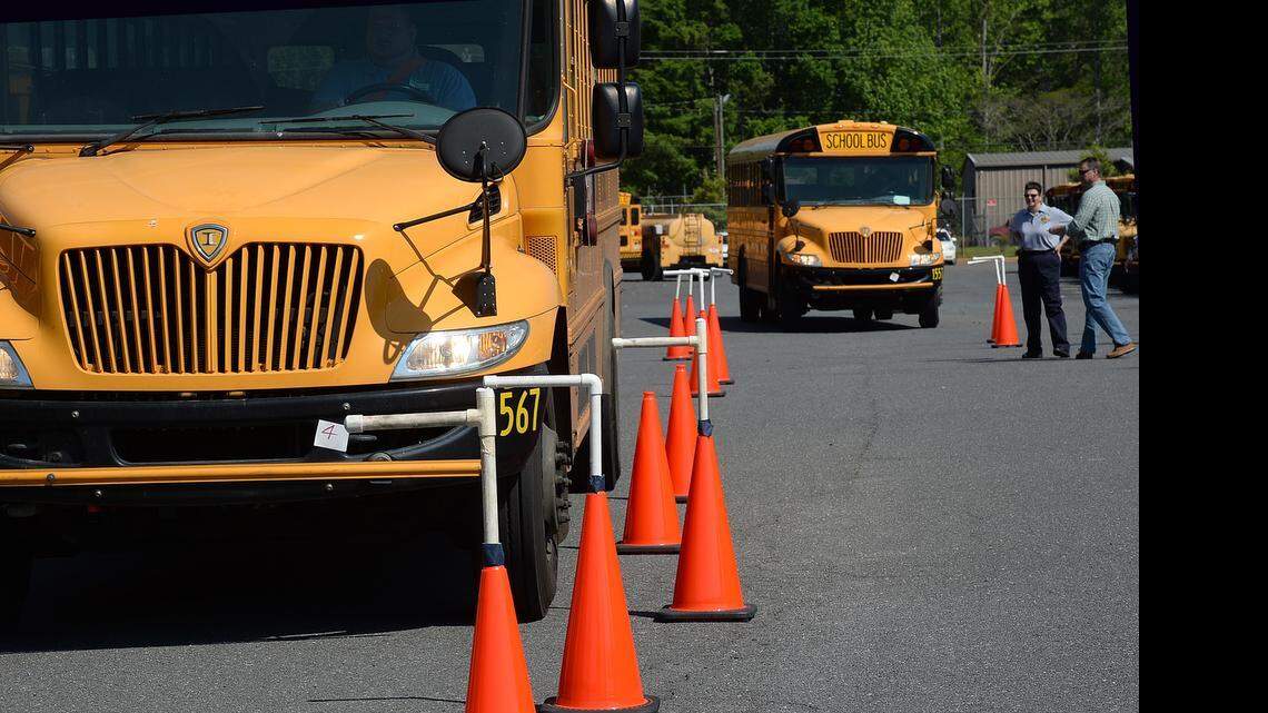 School buses navigate rows of cones testing drivers’ maneuvering skills during Thursday’s Charlotte-Mecklenburg Schools Bus Roadeo.