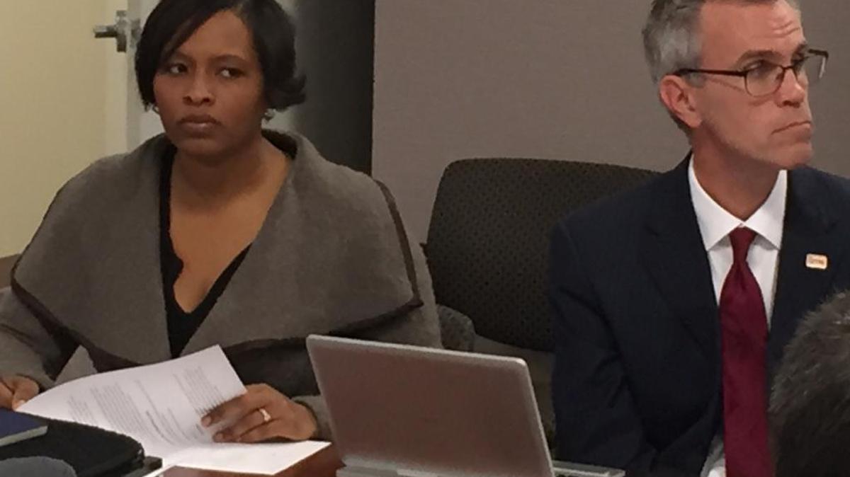 Scott McCully (right) and Akeshia Craven-Howell at a 2015 student assignment review meeting.