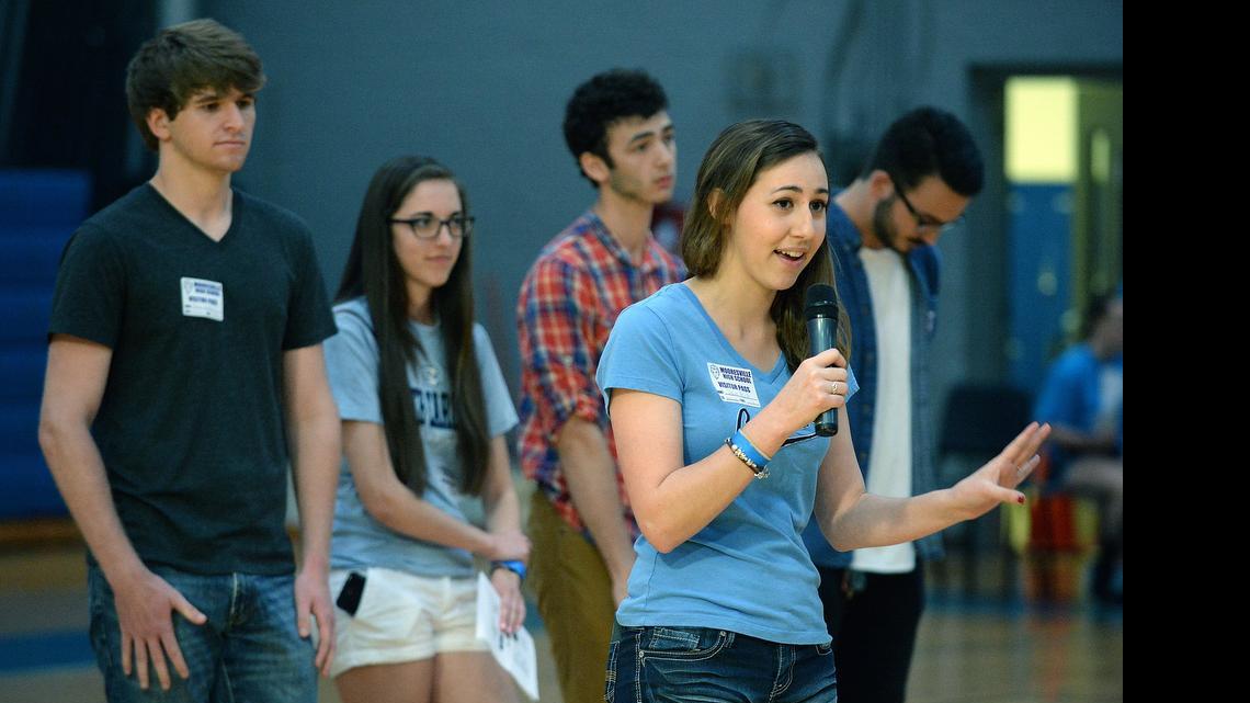 
A sophomore at Chapel Hill, former Mooresville High student Rachel Maguire, 18, talks about her first year at UNC. The seniors at Mooresville High school celebrated their first "Decision Day" pep rally, on Friday, May 15, 2015. Students and facility members celebrated the fact that college applications from the school's students have risen 50 percent over the year before. With fun filled activities throughout the day, students were ask to wear t-shirts of the college they plan to attend this fall to today's event. Also seniors got a chance to hear from former students about their first year in college. 
