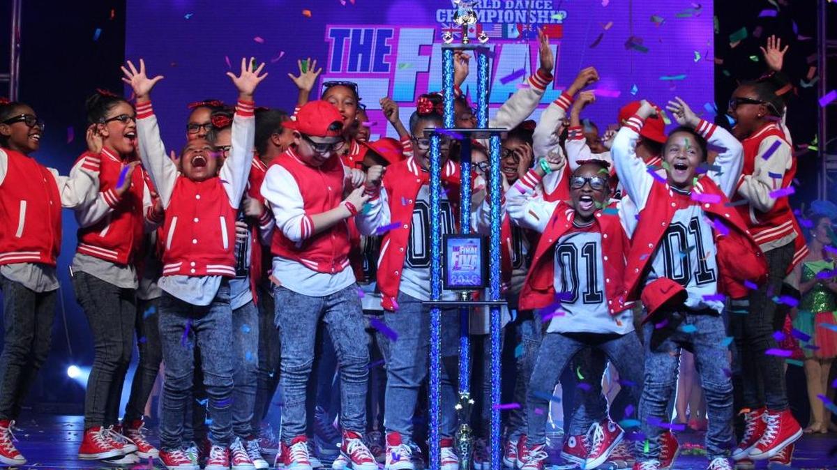 The Winding Springs Elementary dance team celebrates its world championship in Meadowlands, N.J.