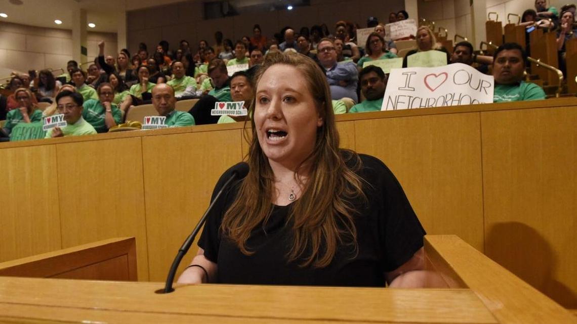 Jessica Miller speaks about student assignment during an April school board meeting.