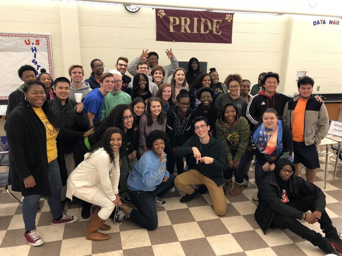 Students from Ardrey Kell and West Charlotte high schools, who dubbed themselves West Kell, pose after spending two hours together at West Charlotte High.