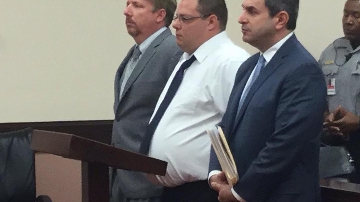 Steven Gentry, center, pleaded guilty to three counts of assasult and battery in a York County courtroom Thursday and was sentenced to 10 years.
