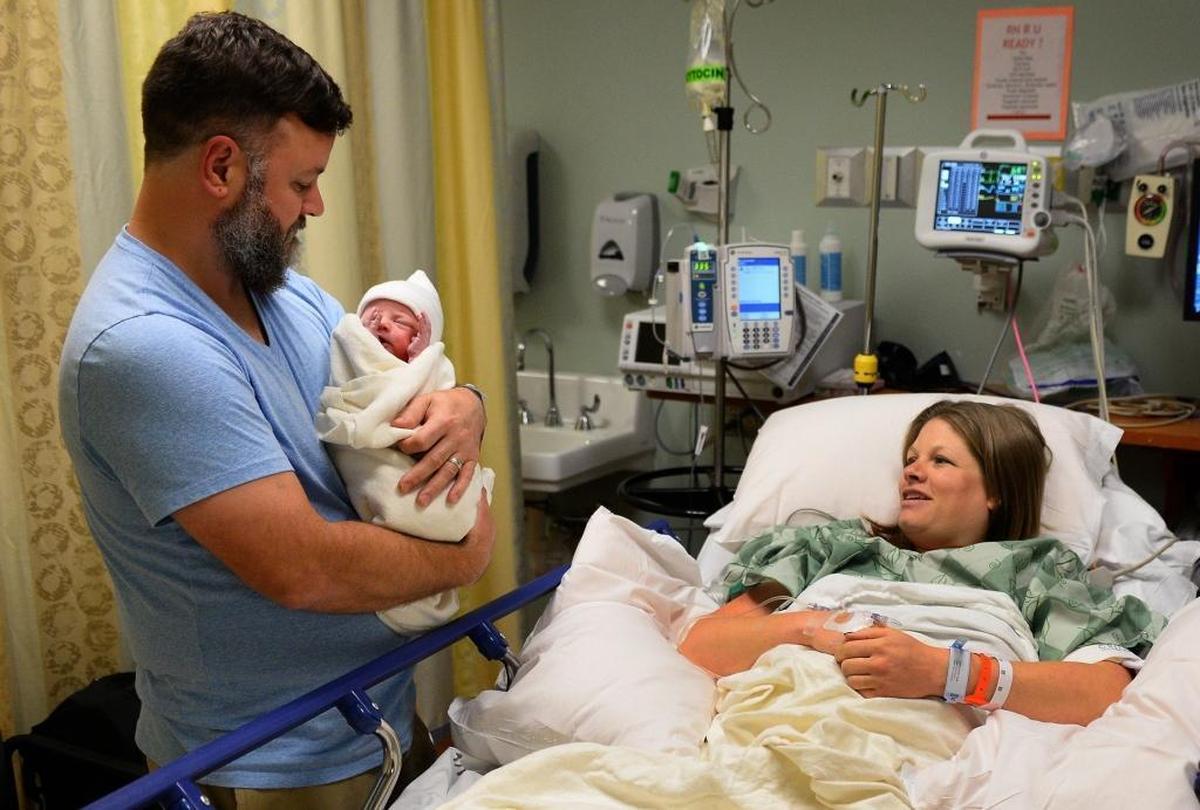 On Monday afternoon at 4:02 p.m. Wess, left, and Lacey Cope, right, welcomed their fourth son, Finn Sullivan Cope, into the world at Novant Health Presbyterian Medical Center.
