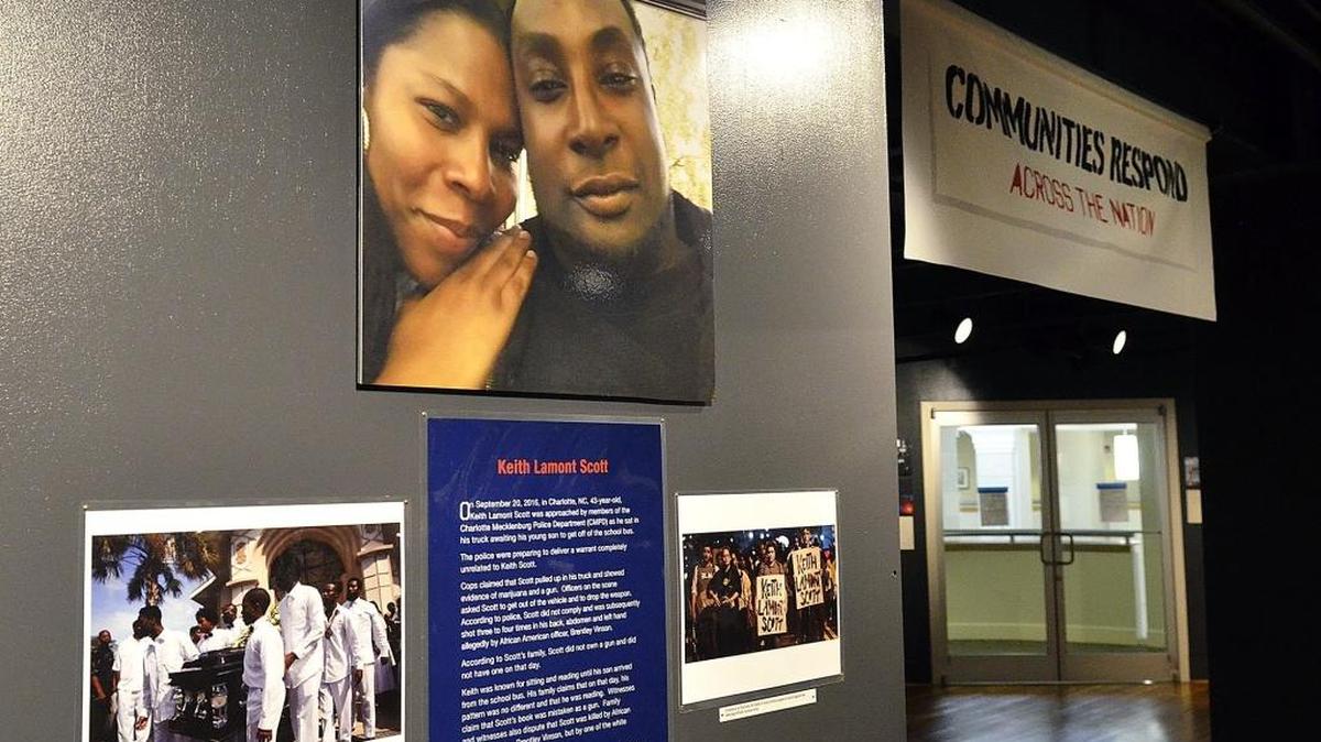A photo of Keith Lamont Scott is part of the “K(NO)W Justice K(NO)W Peace” exhibition at the Levine Museum of the New South.