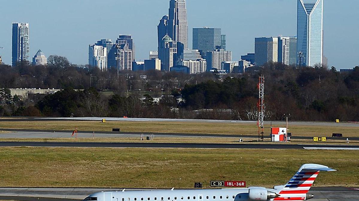 
An American Eagle jet taxis to the terminal at Charlotte Douglas International Airport on Dec. 17, 2014. 
