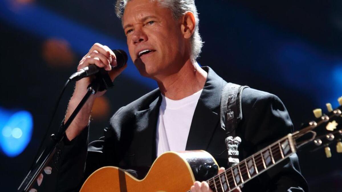 In this June 7, 2013, file photo, Randy Travis performs at the 2013 CMA Music Festival in Nashville, Tenn.
