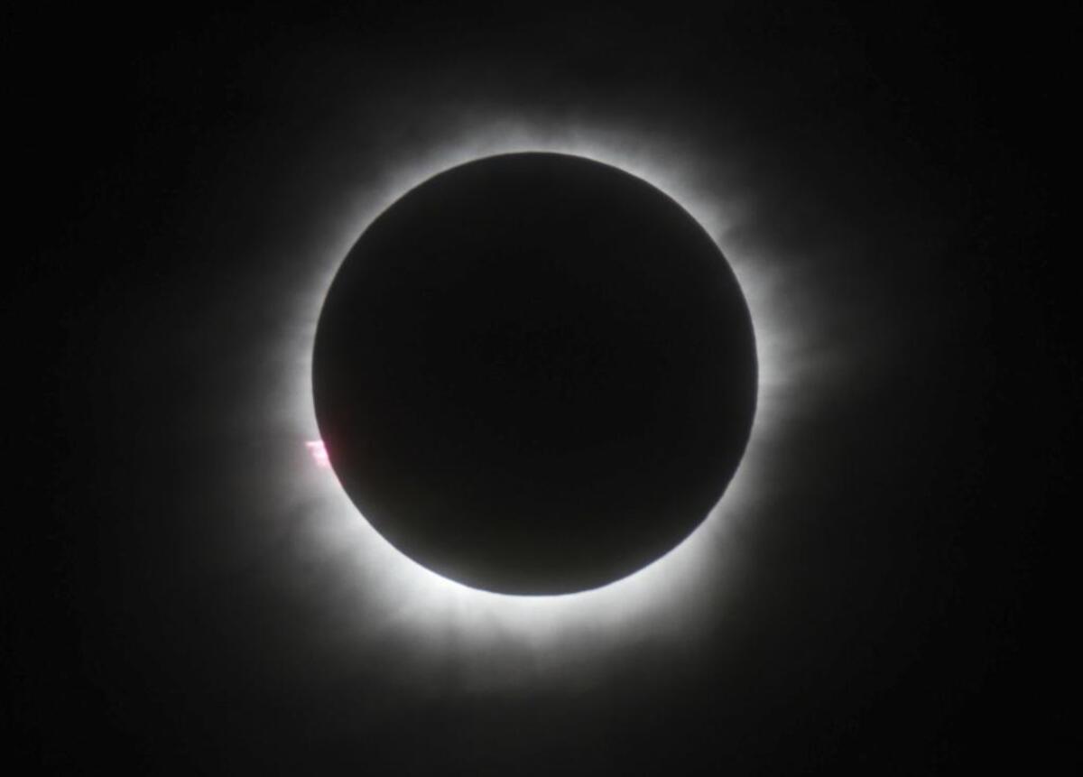 This March 9, 2016 file photo shows a total solar eclipse in Belitung, Indonesia. Hotel rooms already are going fast in states along the path of this year’s solar eclipse.