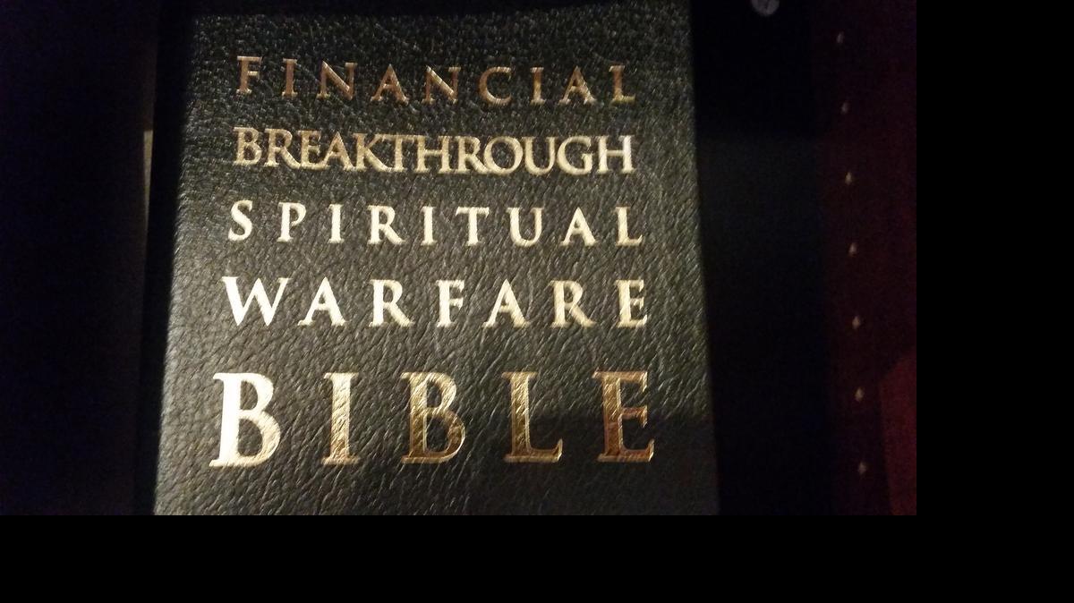 
A copy of the “Financial Breakthrough Spiritual Warfare Bible,” annotated by David Cerullo’s father, Morris, sits in the City of Light bookstore in Indian Land, S.C.
