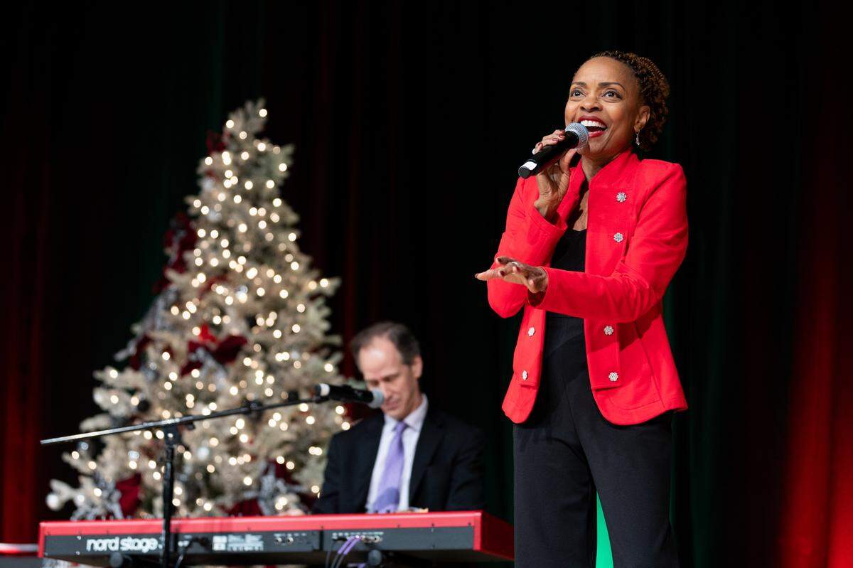 Maria Howell and Noel Friedline perform during the Good Fellows Luncheon Wednesday.