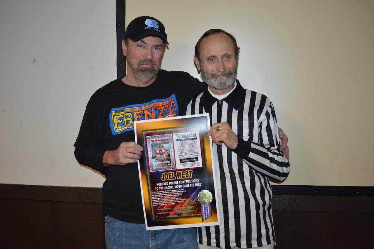 Joel West in an undated photo with Twin Galaxies arcade founder Walter Day.