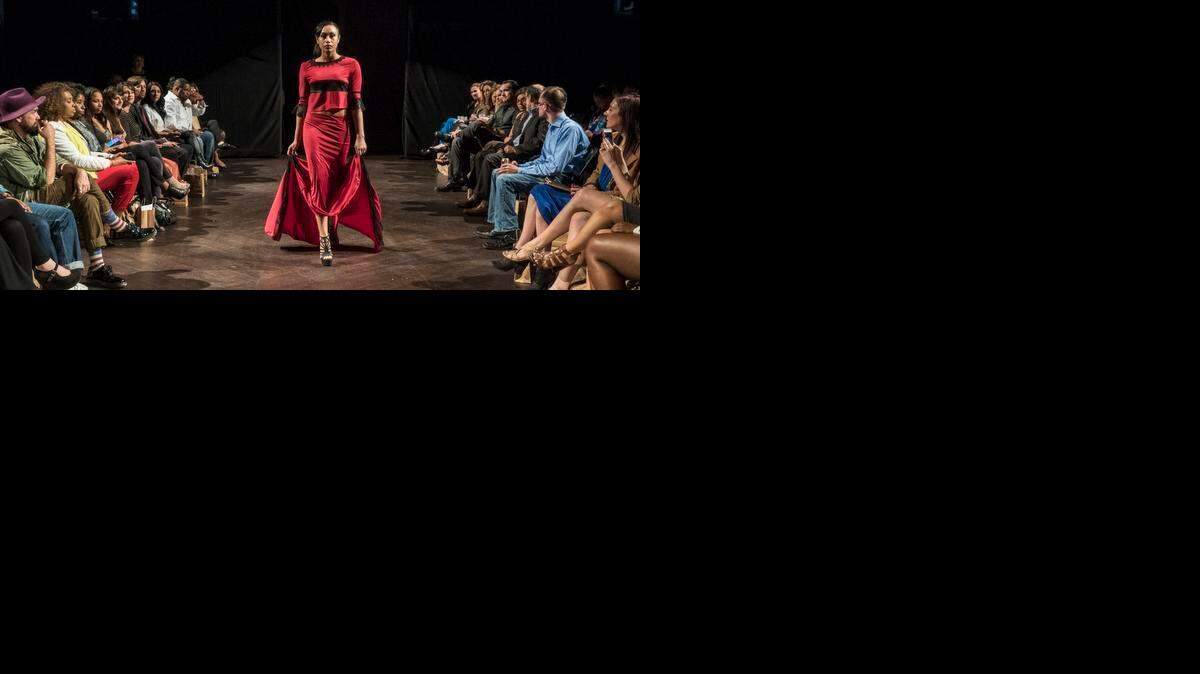 
A model walks the runway in fashions designed by students from The Art Institute of Charlotte on Wednesday at Label House at the NC Music Factory. The show is part of the North Carolina Fashion Association Style Week running through Saturday. The first night’s show included student fashions from The Art Institute, Haute Exclusive, Pewilben, Terrence Henderson and Adnama Nampahc.
